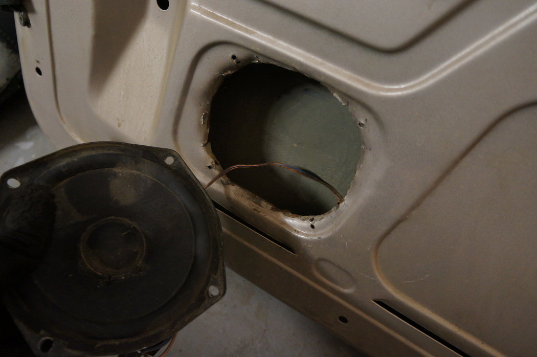 Cant belive the guy cut holes in the door for speakers