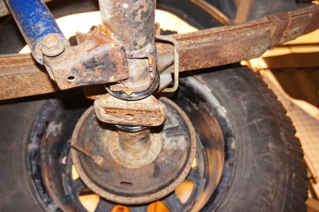 Here is that rear shock mount I told everyone about. Cant believe this, and his weld was awful. What Im gonna try is swap out the front ubolt plates with the rear ones. The front ubolt plates had rods attached that are meant for a shock mount. I measured it out and when I put the leaf springs back under the axle, they will extend out exactly where the old mounts would align, its just they will be about 1&quot; higher. Dont think it will be a large ordeal since I wont be doing any serious off roading with her. If it doesnt work then I will break down and buy shock mounts and weld them on.