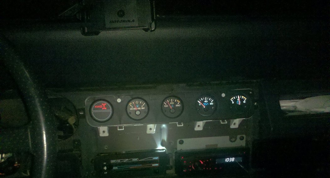Upgraded some dash lights. Before on left and after on right. Also made the 4x4 red